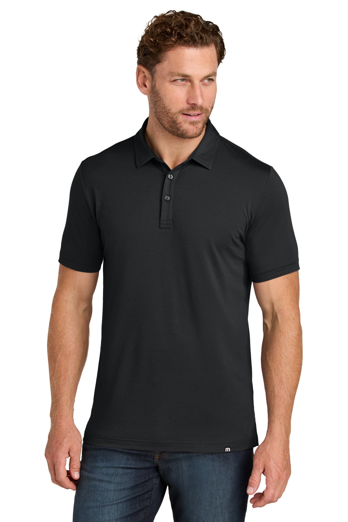 Front View of Black TravisMathew Glenview Solid Polo TMA41461